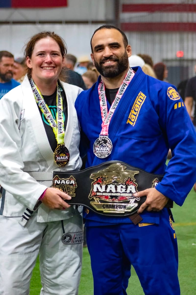 NAGA medals and a championship belt earned by the team